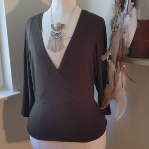 Great low cut blouse with large sleevea